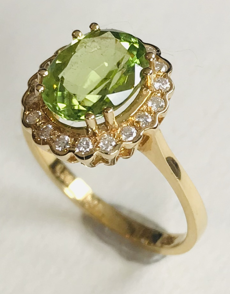 Perydot Brill. Ring 750 GG